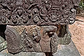 Ta Som temple - fragments of bas relief left on the ground.
